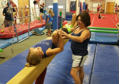 teodora working with a gymnast